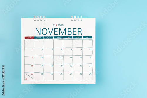 Wallpaper Mural November 2025 Monthly desk calendar for 2025 year on blue color background. Torontodigital.ca
