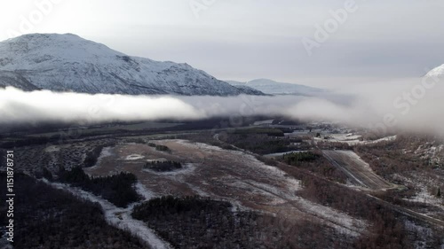 Wallpaper Mural This video captures the mystical beauty of low foggy clouds rolling over a river valley in Norway. The fog creates an ethereal atmosphere, partially obscuring the lush greenery and meandering river be Torontodigital.ca