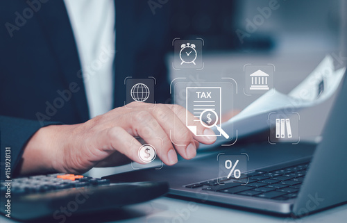 Finance or income concept ,calculating taxes online. Personal income statement, man is filling out personal or business income tax payment form for government agency on virtual computer screen