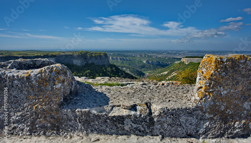 Russia, Republic of Crimea. View of the dilapidated mountains from the top of the dilapidated stone fortress of the famous city of Mangup-Kale of the 5th century in the Bakhchisarai region. photo