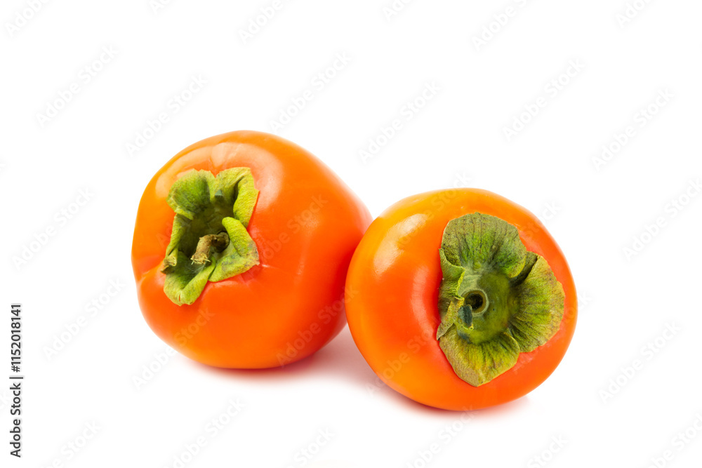 Persimmon isolated on white background. Persimmon fruit. Slice of ripe, juicy, sweet persimmon fruit. Vegan. Fruit garden. Close-up. Persimmon isolated on white background. Persimmon fruit. Slice of ripe, juicy, sweet persimmon fruit. Vegan. Fruit garden. Close-up.