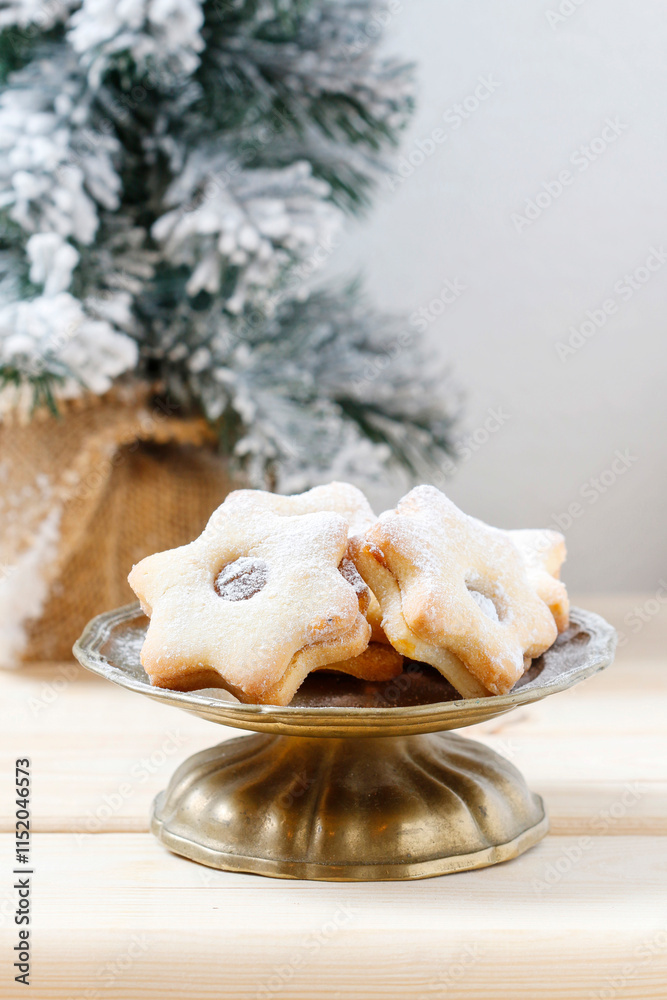Christmas cookies in star shape on the table.