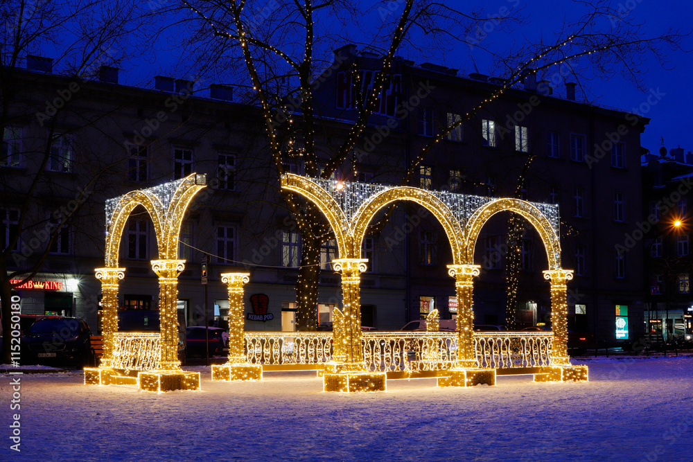 KRAKOW, POLAND - JANUARY 15, 2024: Beautiful Christmas decorations in Krakow at Plac Wolnica in the Kazimierz district.