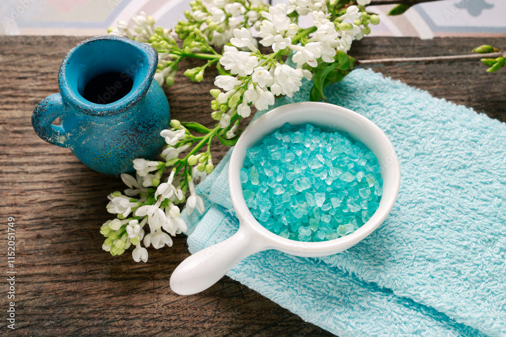 Bowl of blue sea salt in the bathroom.