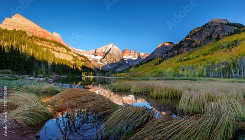 first morning mild touching rockie mountain at maroon bell photo