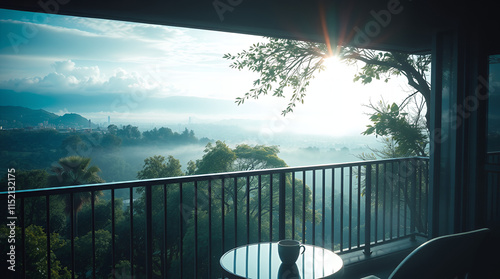 balcony view showcases a misty, mountainous landscape photo