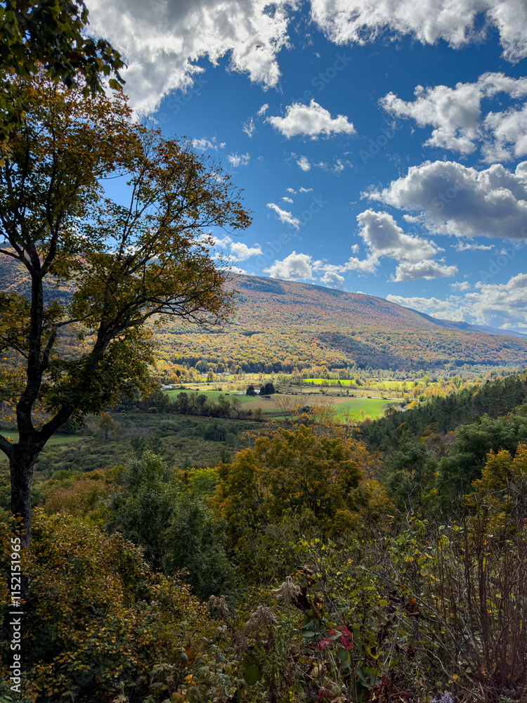 Mountain Landscape with Fall Foliage and Farm in the Valley on a Clear Day Mountain Landscape with Fall Foliage and Farm in the Valley on a Clear Day