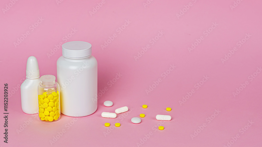 A banner with jars and boxes of medicines, white pills and capsules nearby. A concept for pharmacies, clinics, hospitals, pharmaceuticals, disease treatment, cold season. Copy space for text