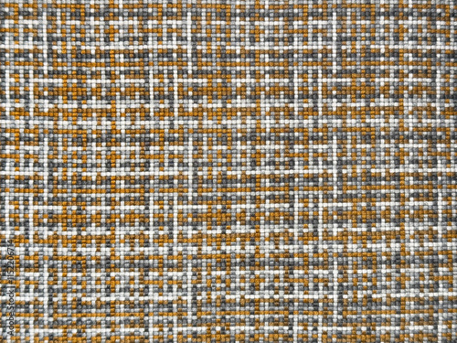 Close up of random white, black, and yellow fabric in small pixels and checkerboard pattern photo