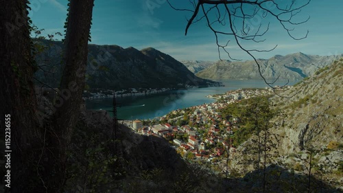 Scenic view of a tranquil Kotor bay surrounded by majestic mountains