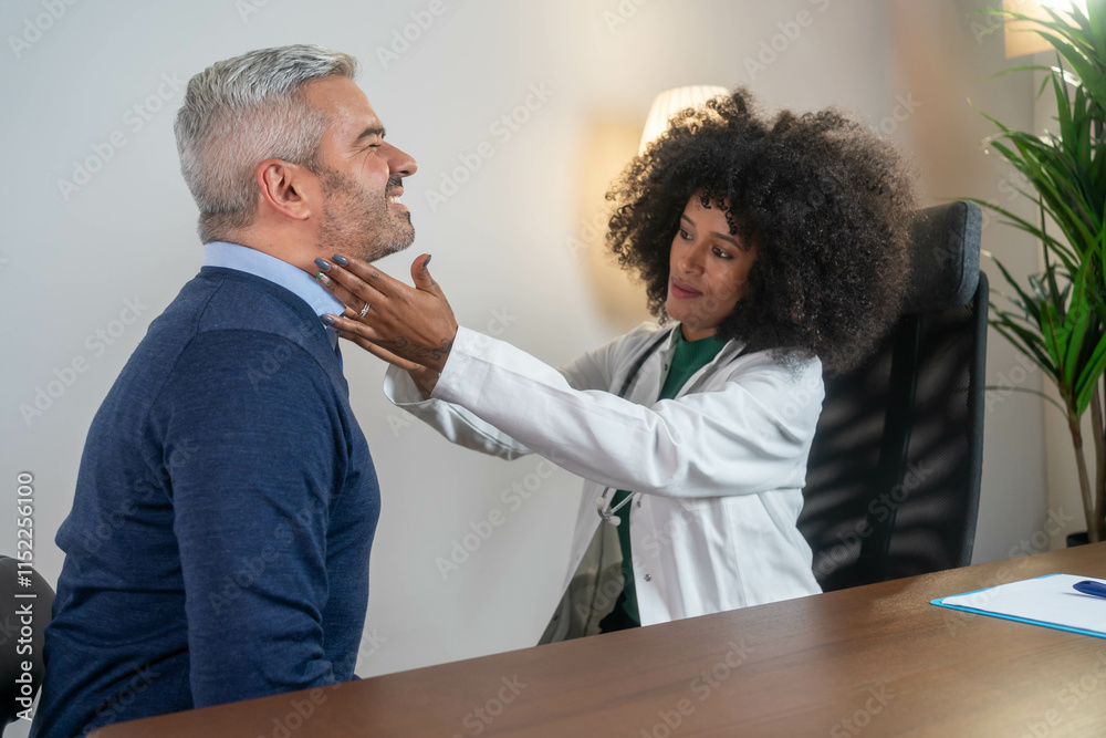 Fototapeta premium Endocrinologist examining throat of man in clinic. Men with thyroid gland test . Endocrinology, hormones and treatment. Inflammation of the sore throat 