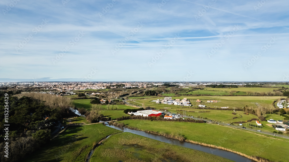 Aerial drone view of a flood zone along the Jaunay River near Givrand, France Aerial drone view of a flood zone along the Jaunay River near Givrand, France