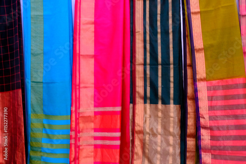 Hand Weaving Silk and Handloom Sarees, saree with golden details, woman wear on festival, ceremony and weddings, expensive sarees are famous for their gold zari, brocade. Incredible India. photo