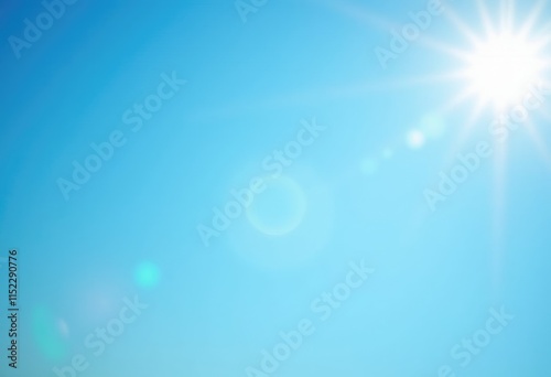 A bright  clear blue sky with the sun shining brightly.