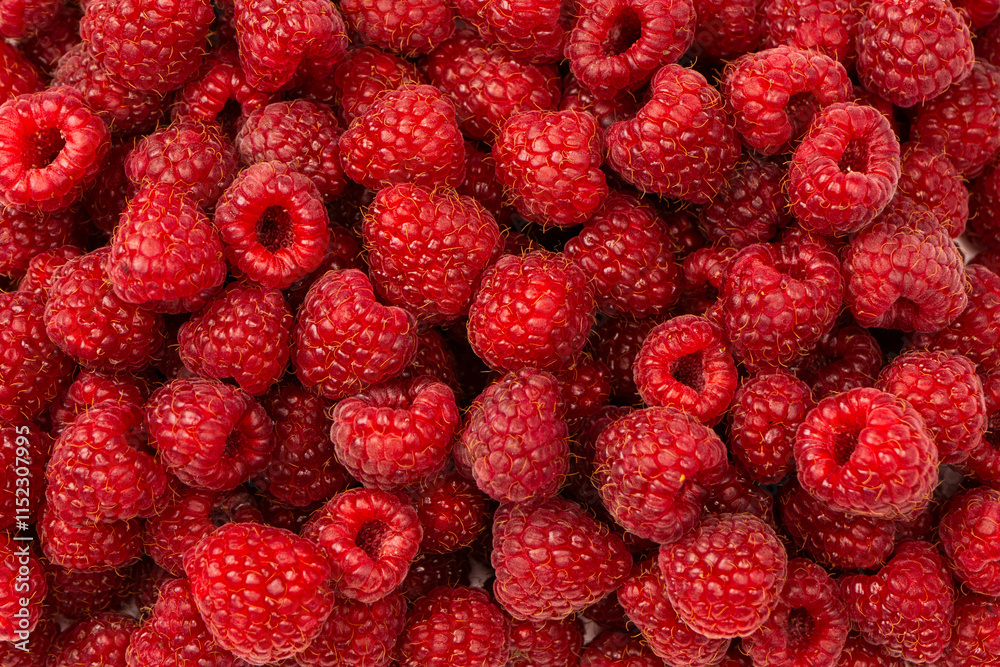 Tasty fresh raspberry as a background. Tasty fresh raspberry as a background.