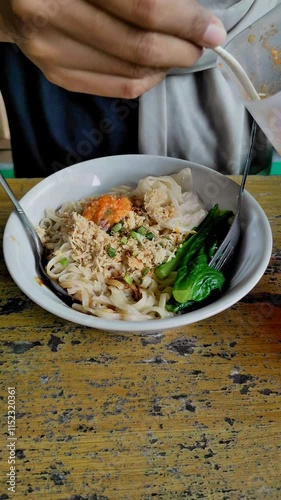Wallpaper Mural A delicious bowl of noodles with fresh vegetables is being served Torontodigital.ca
