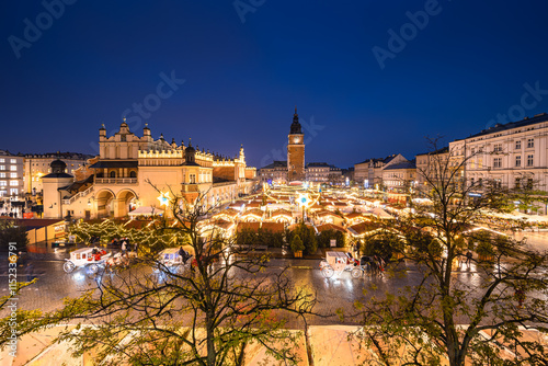 Obraz na płótnie View of the Krakow Christmas Market 2024 and the historic Old Town Square, beautifully illuminated with festive lights and vibrant holiday atmosphere. w salonie
