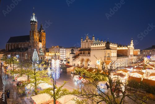 Obraz na płótnie View of the Krakow Christmas Market 2024 and the historic Old Town Square, beautifully illuminated with festive lights and vibrant holiday atmosphere. w salonie