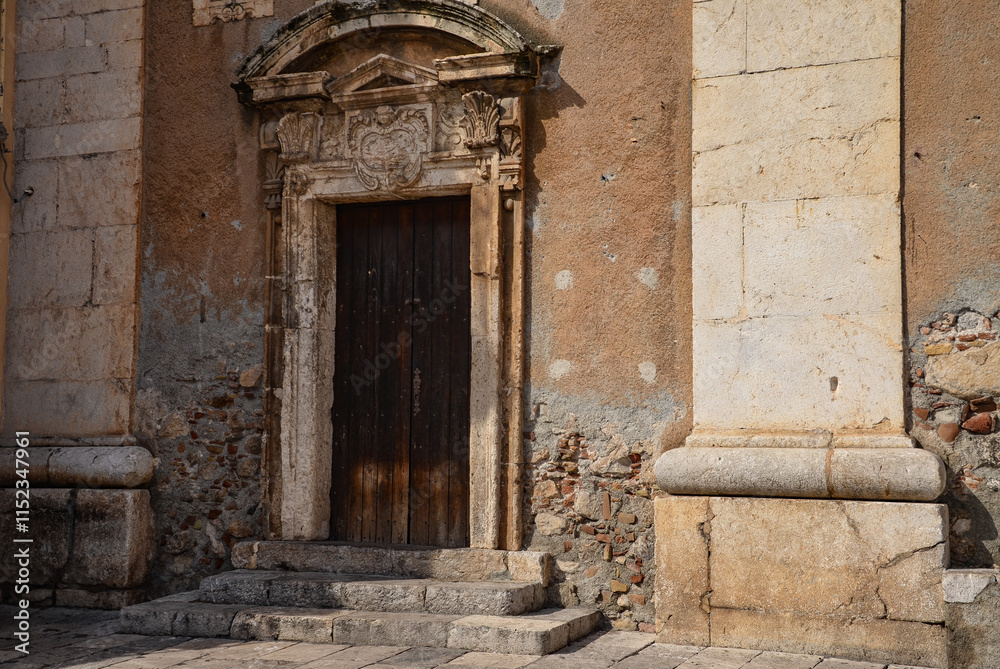 old antique door to the church of St. Catherine in Taormina, Sicily old antique door to the church of St. Catherine in Taormina, Sicily
