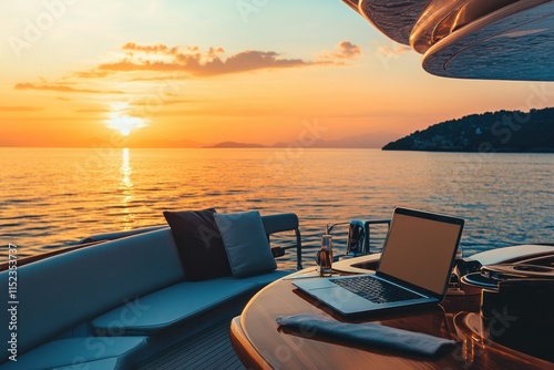 Stunning Sunset View from a Luxury Yacht with a Laptop on the Table, Perfect for Remote Work and Leisure at Sea, Relaxation Concept and Serene Atmosphere