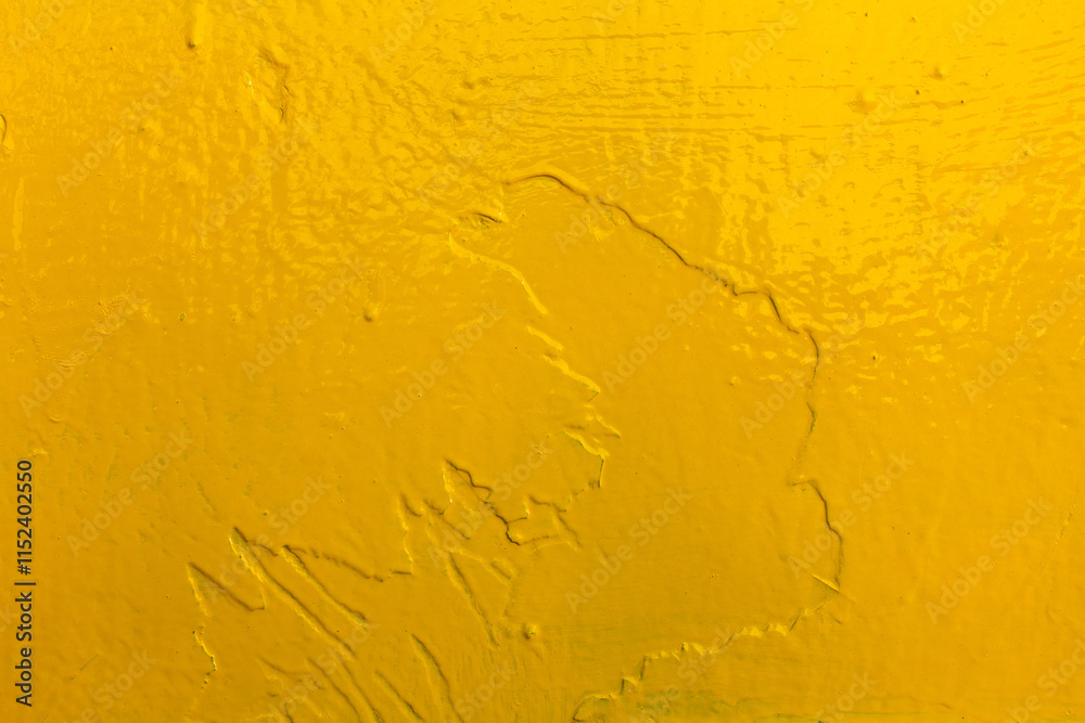 Bright yellow textured surface with visible brush strokes and imperfections, abstract background. Bright yellow textured surface with visible brush strokes and imperfections, abstract background.