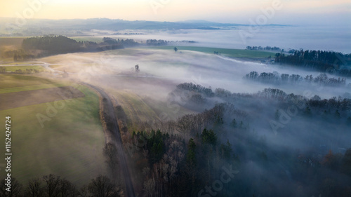 Chýnov Bridge at sunrise in the morning fog. Granite viaduct built in the village of Chýnov in South Bohemia