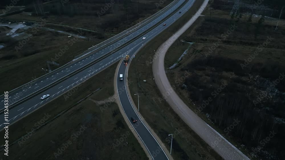 A stunning aerial view showcasing a beautifully curved highway along with the surrounding landscape A stunning aerial view showcasing a beautifully curved highway along with the surrounding landscape
