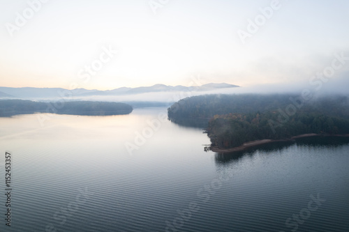 Aerial View of a Foggy Sunrise over Lake Chatuge in the Blue Ridge Mountains photo