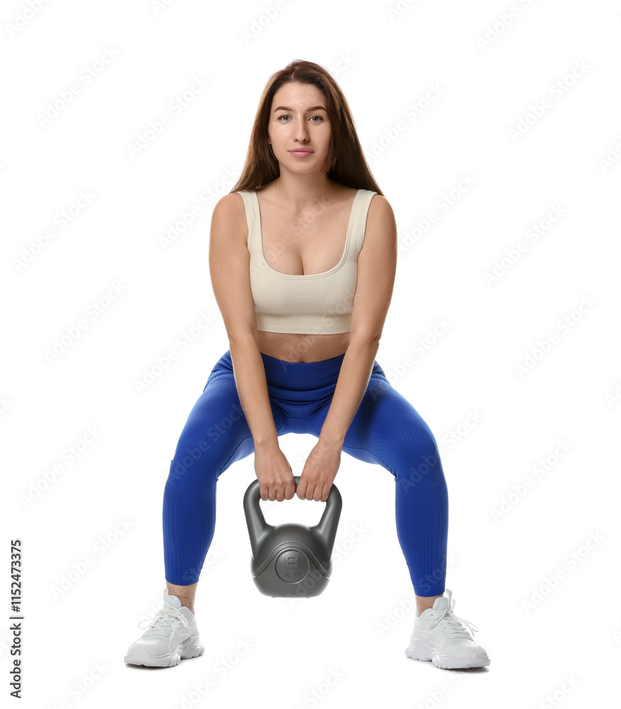Woman in sportswear exercising with kettlebell on white background Woman in sportswear exercising with kettlebell on white background