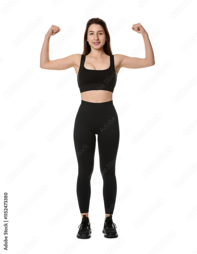 Woman in sportswear showing her biceps on white background Woman in sportswear showing her biceps on white background