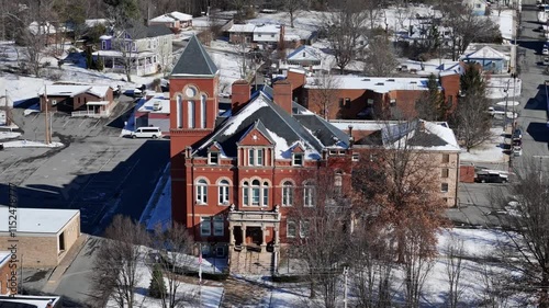 A winter rotating aerial establishing shot of the Fayetteville City Courthouse in West Virginia.  	 photo