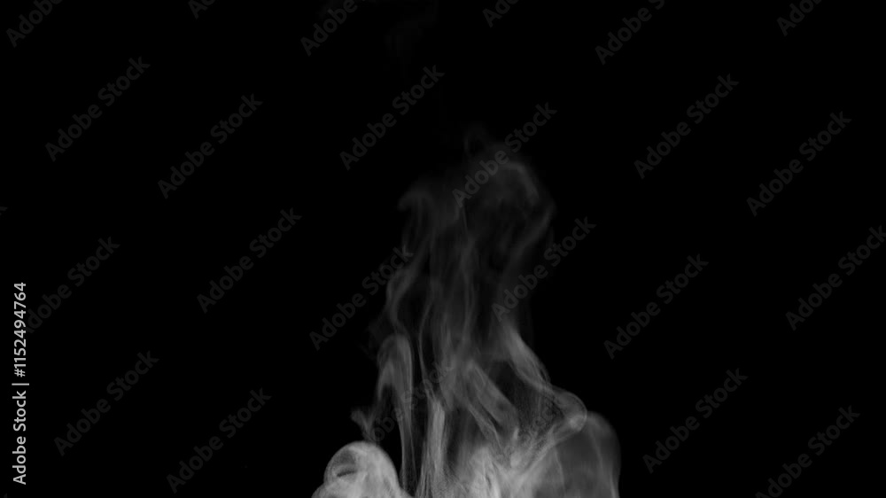 Trickle of Steam Slowly Rising from the Cup. White steam rises light, graceful twists on a black background. Slow motion. Footage is perfect for the layer with different blending modes. Trickle of Steam Slowly Rising from the Cup. White steam rises light, graceful twists on a black background. Slow motion. Footage is perfect for the layer with different blending modes.