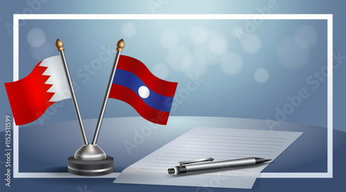 Bahrain and Laos National flags on small table with bokeh background, cooperative relationship