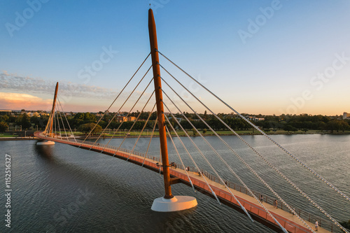 Golden Boorloo Bridge at sunset across the Swan River in Perth, Western Australia