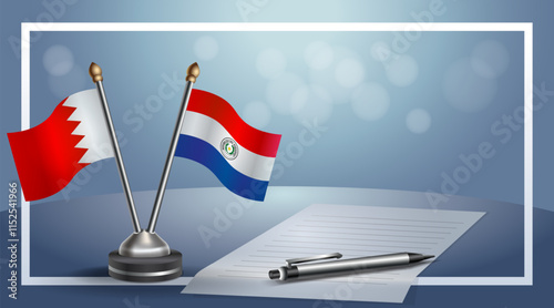 Bahrain and Paraguay National flags on small table with bokeh background, cooperative relationship