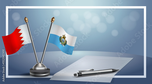 Bahrain and San Marino National flags on small table with bokeh background, cooperative relationship