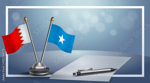 Bahrain and Somalia National flags on small table with bokeh background, cooperative relationship