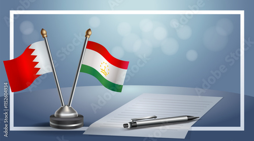 Bahrain and Tajikistan National flags on small table with bokeh background, cooperative relationship