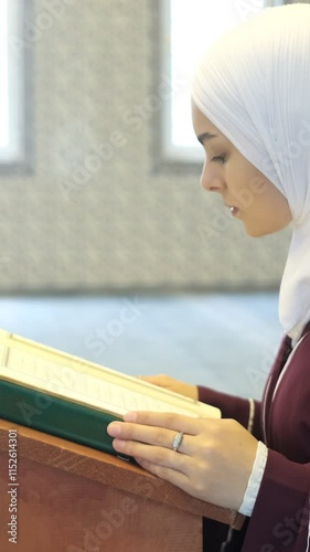 Woman Reading Quran photo