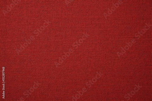 a close up of a red fabric textured background with a slight pattern