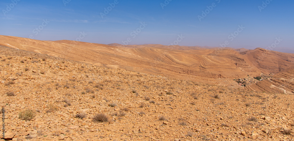 Desert valley in the Moroccan countryside near the Atlas Mountains Desert valley in the Moroccan countryside near the Atlas Mountains