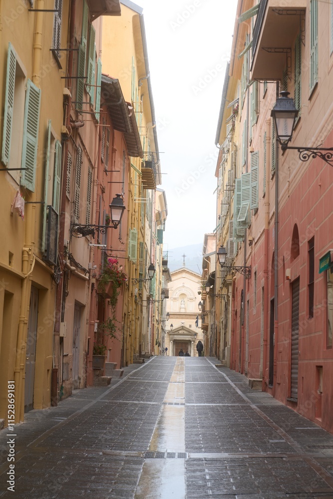 Naklejka premium Colorful streets of Menton, France revealing charming architecture and a quiet afternoon atmosphere
