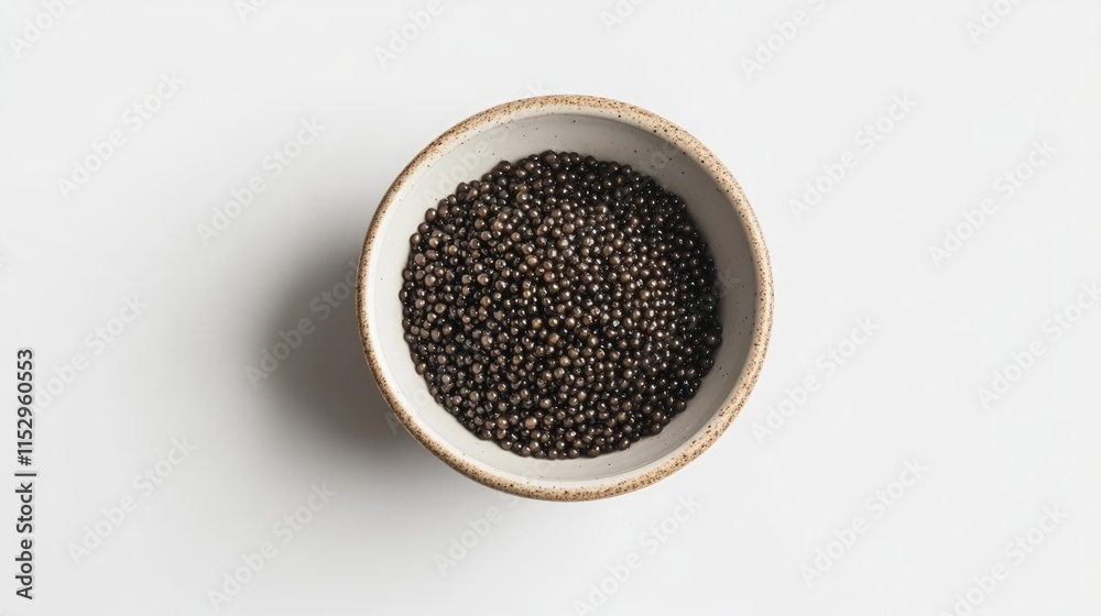 Delicious black caviar delicately arranged in a white bowl on a clean white background emphasizing gourmet luxury and culinary elegance Delicious black caviar delicately arranged in a white bowl on a clean white background emphasizing gourmet luxury and culinary elegance