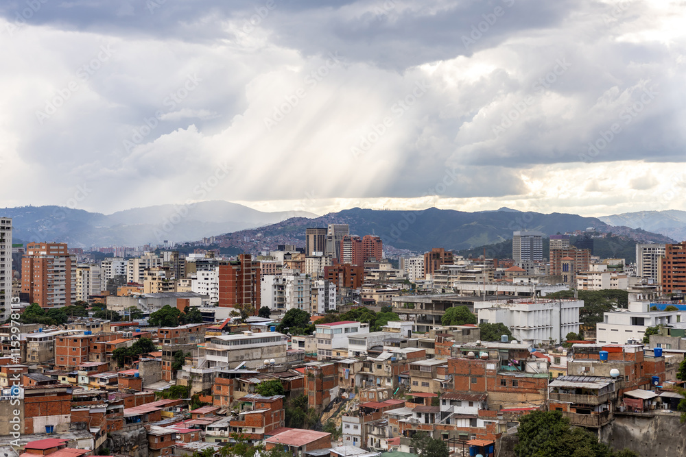 View of the west side of the city of Caracas - Venezuela with reflected sun rays View of the west side of the city of Caracas - Venezuela with reflected sun rays
