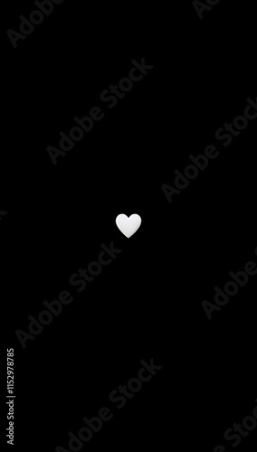 A minimal phone HD wallpaper featuring a small white heart on a black background.

