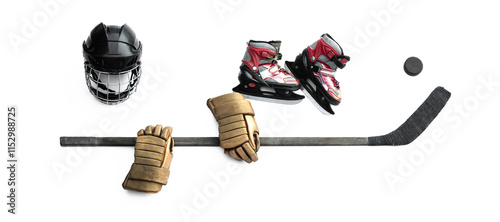 old hockey stick and hockey helmet isolated on white background photo