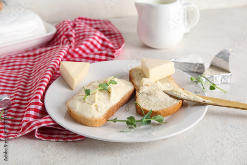 Plate with fresh bread, tri...
