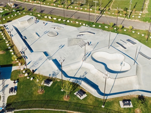 Aerial view of a vibrant skate park, complete with ramps and obstacles, nestled within a park. Skater enjoying the park. RIVERSIDE SKATEPARK, DETROIT, MICHIGAN, UNITED STATES