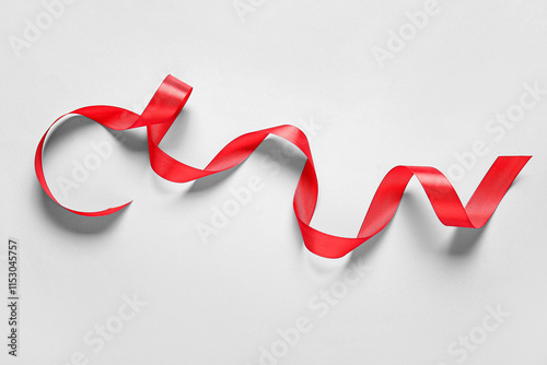 Red satin ribbon curled and...