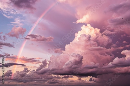 Dreamy Pastel Pink Purple Sky with Fluffy Clouds and Rainbow - Fantasy Art Background